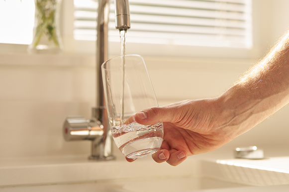 Family using water filter